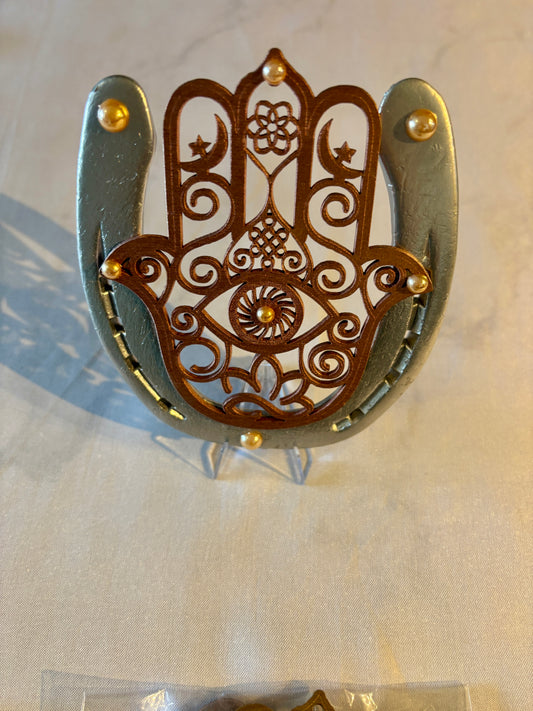 fer à cheval et son symbole : main de fatima