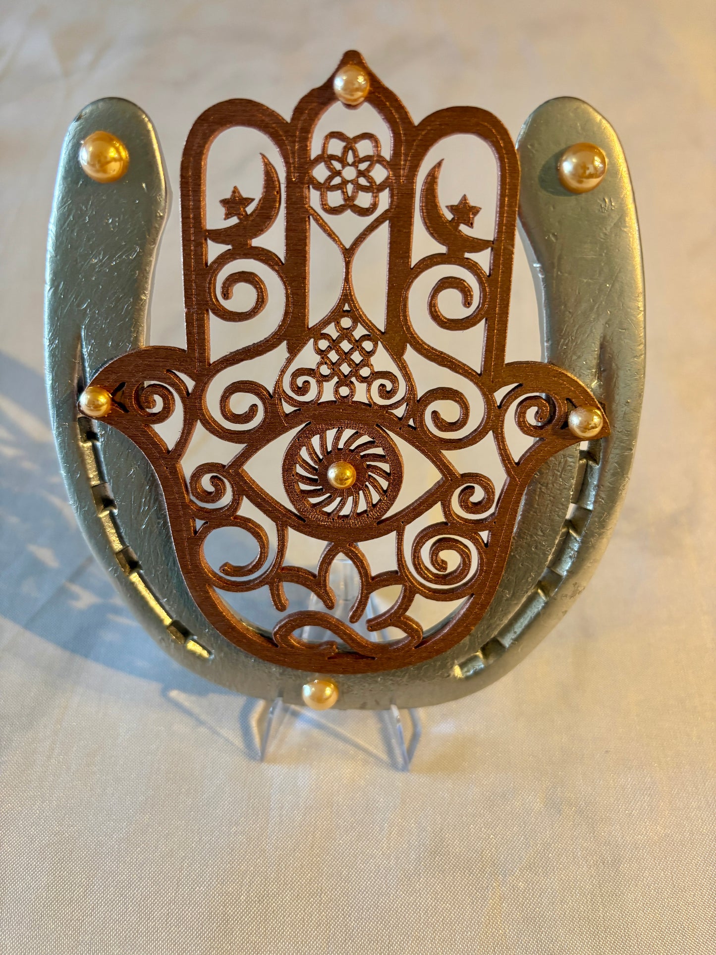 fer à cheval et son symbole : main de fatima