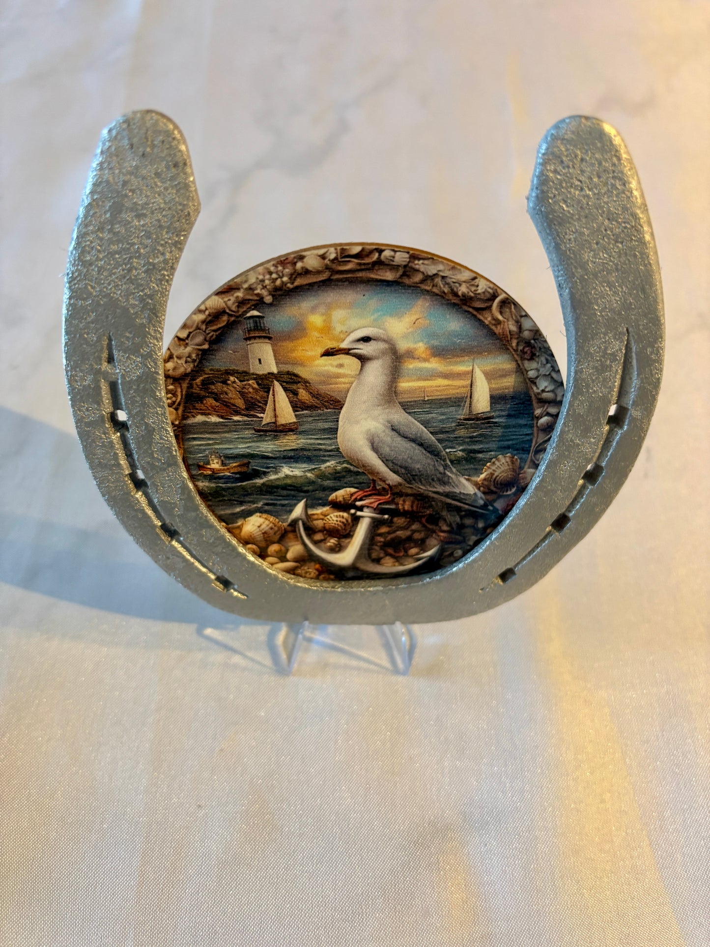 fer à cheval et son symbole : La mer