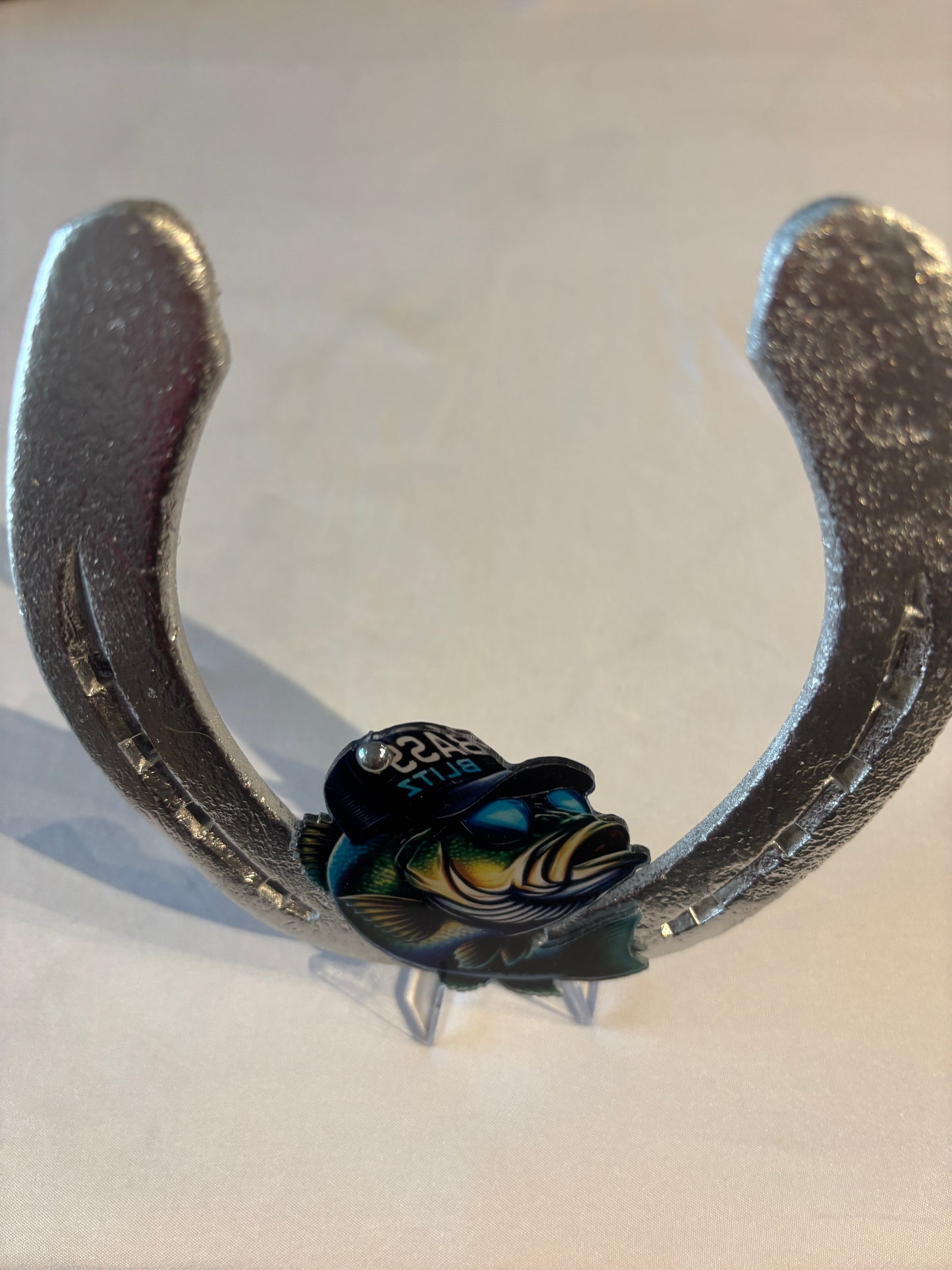 fer à cheval / symbole poisson