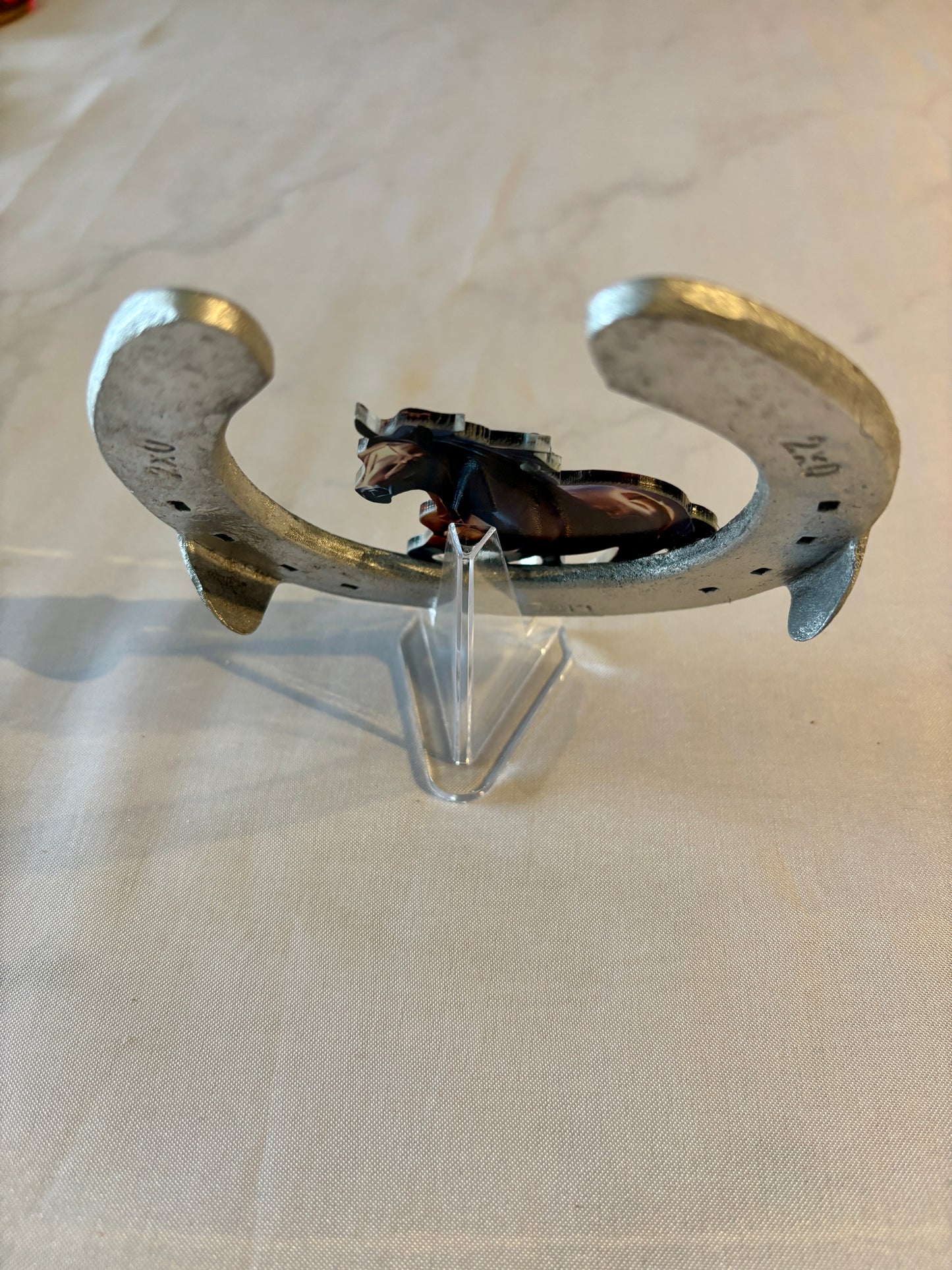 fer à cheval et son cheval
