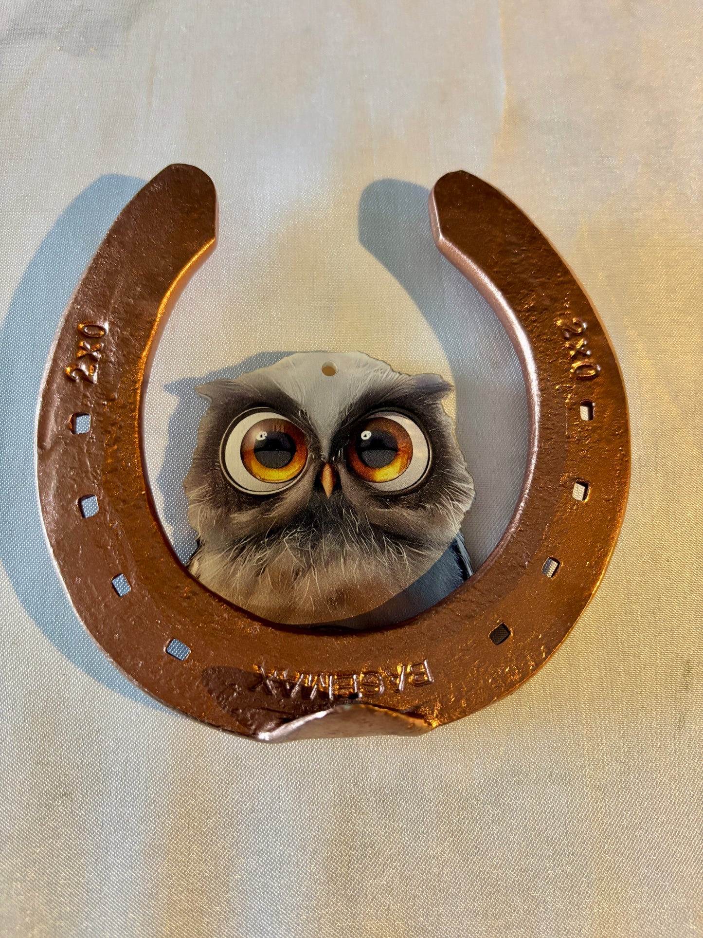 fer à cheval et sa chouette / hibou