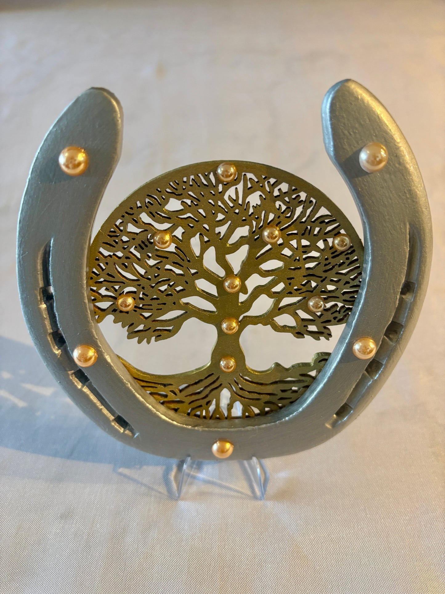 Fer à cheval avec son symbole l’arbre de vie