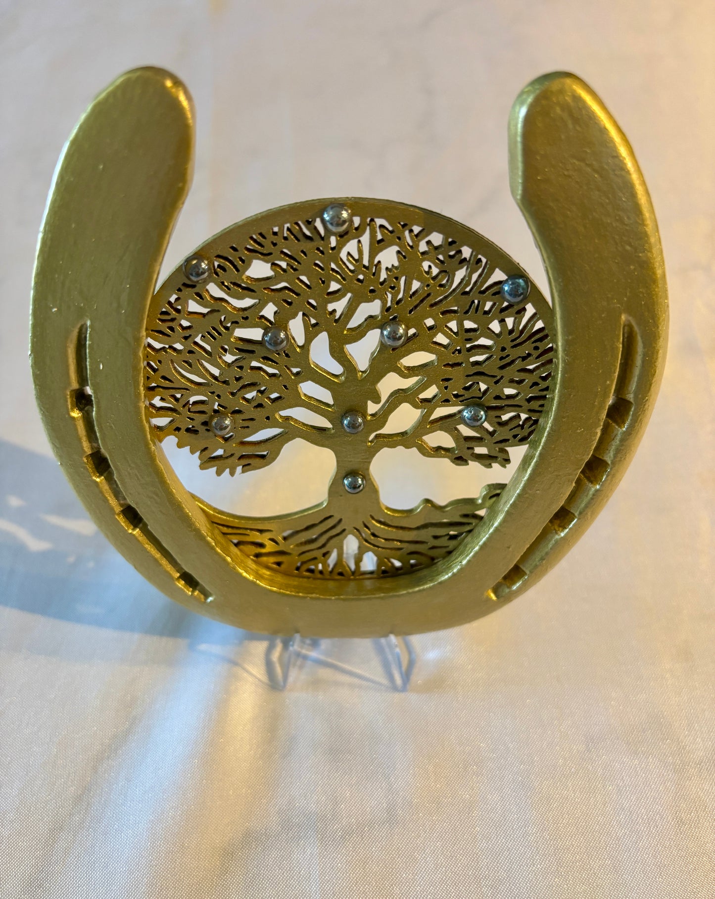 Fer à cheval et son symbole : L’arbre de vie